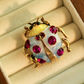 Broche de Joaninha de Sete Estrelas Cravejado de Strass