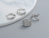 4 piercing Decorados com Zircônia Cúbica em Material de Cobre