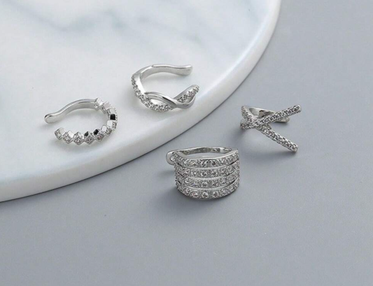 4 piercing Decorados com Zircônia Cúbica em Material de Cobre