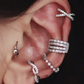 4 piercing Decorados com Zircônia Cúbica em Material de Cobre